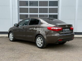 2014 Kia Rio 6-speed III, коричневый, 723000 рублей, вид 3