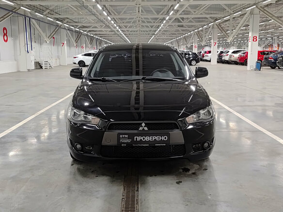 2010 Mitsubishi Lancer X, чёрный - вид 1