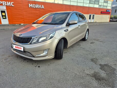 2013 Kia Rio 5-speed III, бежевый, 699000 рублей, вид 2