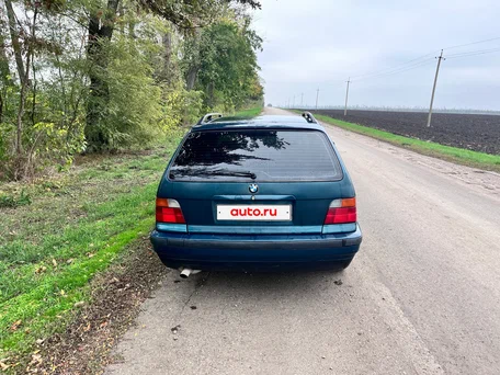 1997 BMW 3 серии 318i III (E36), зелёный, 290000 рублей, вид 5