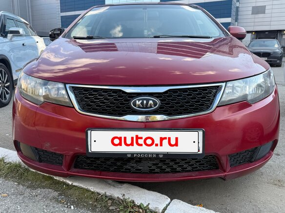 2010 Kia Cerato 6-speed II, красный - вид 4