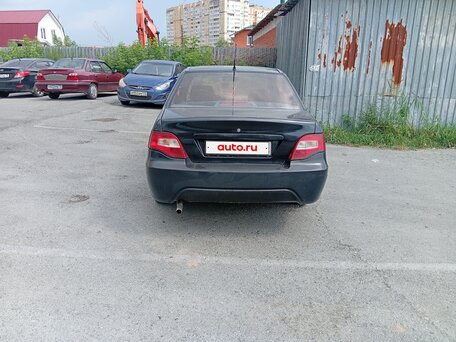 2010 Daewoo Nexia I Рестайлинг, чёрный, 100000 рублей, вид 3