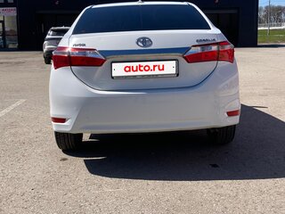 2014 Toyota Corolla XI (E160, E170, E180), белый, 850000 рублей, вид 5