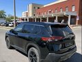 2023 Nissan Rogue III, чёрный - вид 11