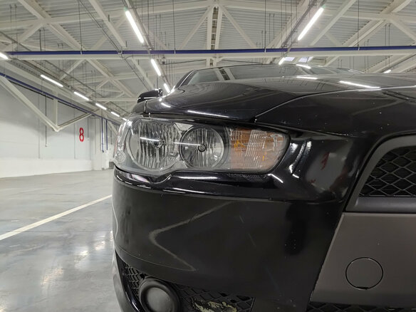 2010 Mitsubishi Lancer X, чёрный - вид 16