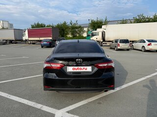 2020 Toyota Camry VIII (XV70), чёрный, 3390000 рублей, вид 4