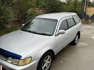 1999 Toyota Corolla VII (E100), серебристый, 300000 рублей, вид 1