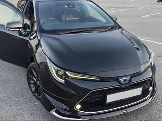 2022 Toyota Corolla XII (E210), чёрный, 1650000 рублей, вид 2