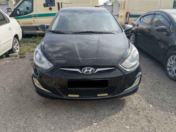 2014 Hyundai Solaris I, чёрный, 674000 рублей - вид 2