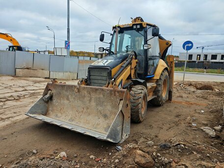 2011 Caterpillar 428, жёлтый, 4300000 рублей, вид 4