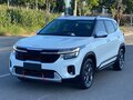 2023 Kia Seltos I Рестайлинг, белый, 1733000 рублей