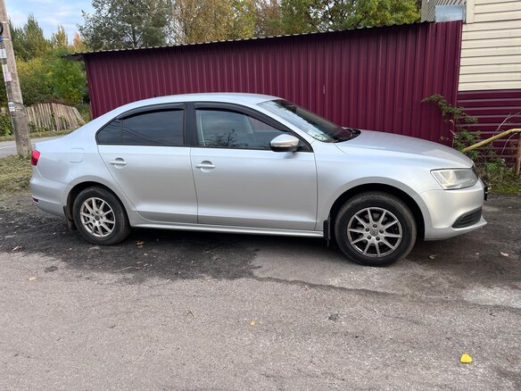 2014 Volkswagen Jetta VI, серебристый - вид 5