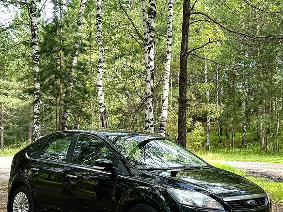 2010 Ford Focus II Рестайлинг, чёрный, 673000 рублей - вид 2