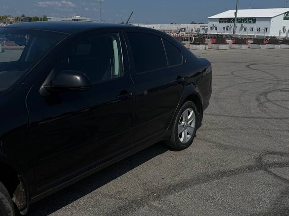 2011 Skoda Octavia II (A5) Рестайлинг, чёрный, 650000 рублей - вид 5