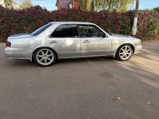 1995 Nissan Laurel VII (C34), серебристый, 600000 рублей, вид 2