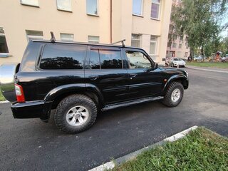 2003 Nissan Patrol V (Y61), чёрный, 990000 рублей, вид 2