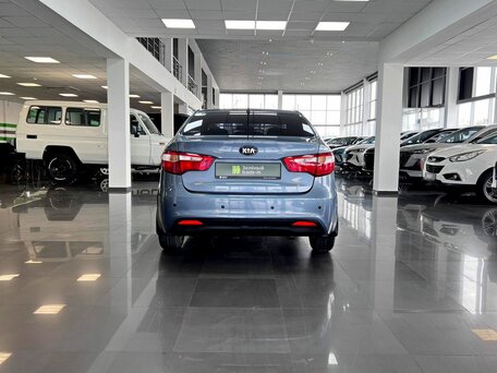 2013 Kia Rio 5-speed III, голубой, 745000 рублей, вид 4