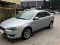 2008 Mitsubishi Lancer X, серебристый - вид 1