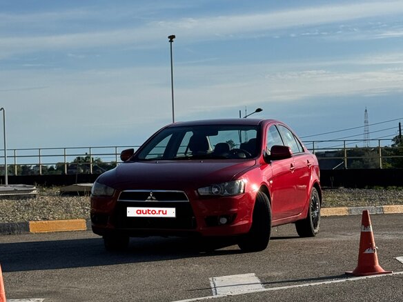 2007 Mitsubishi Lancer X, красный, 635000 рублей - вид 17