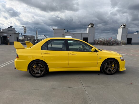 2006 Mitsubishi Lancer Evolution IX, жёлтый - вид 3