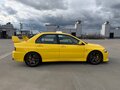 2006 Mitsubishi Lancer Evolution IX, жёлтый - вид 3