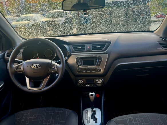 2012 Kia Rio 4-speed III, бежевый - вид 11