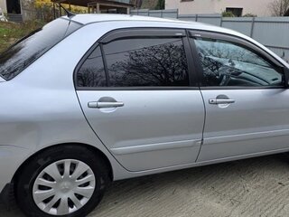 2009 Mitsubishi Lancer Classic IX Рестайлинг, серебристый, 650000 рублей, вид 4