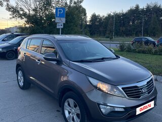 2013 Kia Sportage III, коричневый, 925000 рублей, вид 1