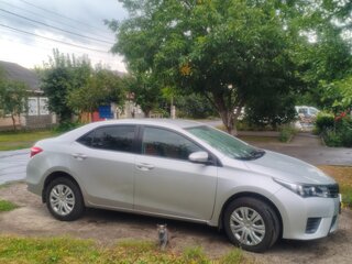 2014 Toyota Corolla XI (E160, E170, E180), серый, 950000 рублей, вид 2