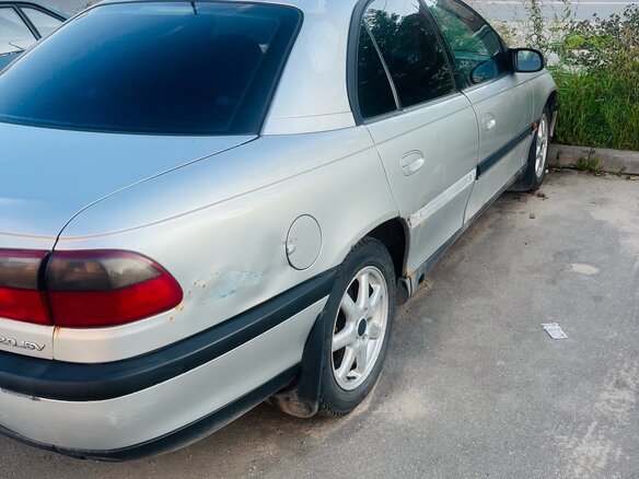 1999 Opel Omega B, серебристый - вид 1