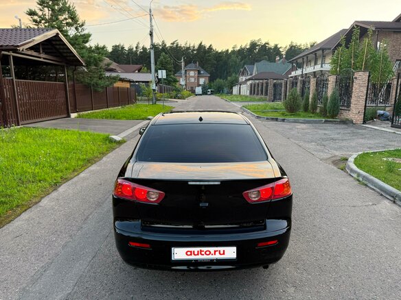2012 Mitsubishi Lancer X Рестайлинг, чёрный, 669000 рублей - вид 6