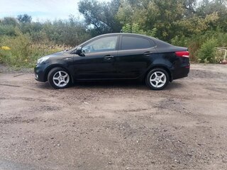 2015 Kia Rio III Рестайлинг, чёрный, 860000 рублей, вид 4