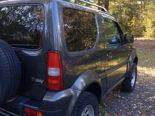 2011 Suzuki Jimny III Рестайлинг 1, чёрный, 1400000 рублей, вид 3