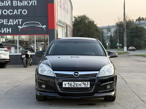 2010 Opel Astra H Рестайлинг, чёрный - вид 1