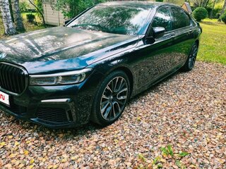 2022 BMW 7 серии 740d xDrive VI (G11/G12) Рестайлинг, чёрный, 9432038 рублей, вид 2