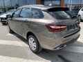 2026 Lada (ВАЗ) Vesta SW I Рестайлинг (NG), коричневый, 1830000 рублей - вид 1