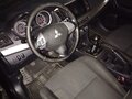 2008 Mitsubishi Lancer X, чёрный, 780000 рублей - вид 9