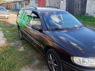 1995 Opel Omega B, пурпурный, 220000 рублей, вид 1