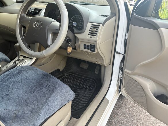 2010 Toyota Corolla Axio X (E140, E150) Рестайлинг, белый, 740000 рублей - вид 5
