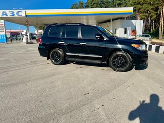 2012 Toyota Land Cruiser 200 Series Рестайлинг 1, чёрный, 4399000 рублей, вид 2