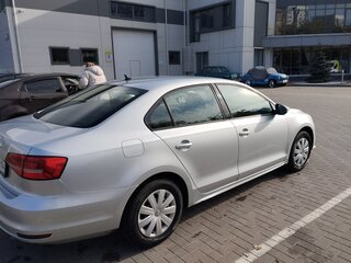 2015 Volkswagen Jetta VI Рестайлинг, серебристый, 750000 рублей, вид 4