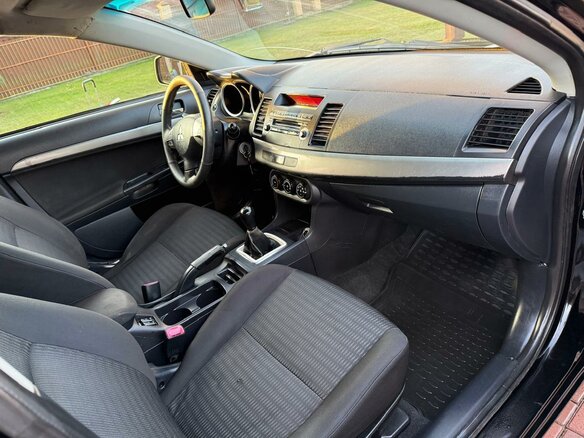 2012 Mitsubishi Lancer X Рестайлинг, чёрный, 669000 рублей - вид 13
