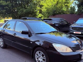 2006 Mitsubishi Lancer IX Рестайлинг, чёрный, 410000 рублей, вид 2