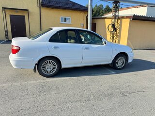 2001 Nissan Bluebird Sylphy I (G10), белый, 420000 рублей, вид 2