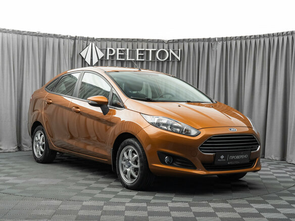 2015 Ford Fiesta Mk6 Рестайлинг, оранжевый - вид 1