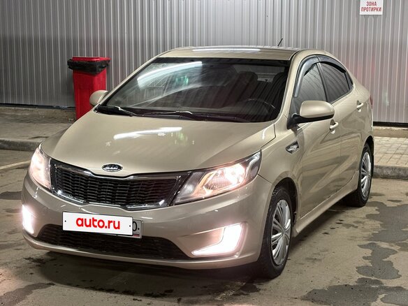 2011 Kia Rio 5-speed III, бежевый, 465000 рублей - вид 10