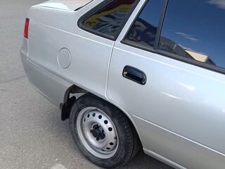 2009 Daewoo Nexia I Рестайлинг, серебристый, 240000 рублей, вид 3