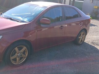 2011 Kia Cerato 6-speed II, красный, 560000 рублей, вид 5