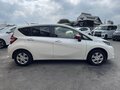 2017 Nissan Note II Рестайлинг, белый, 730000 рублей - вид 2