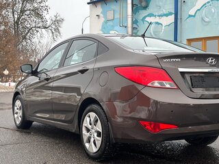 2014 Hyundai Solaris I Рестайлинг, коричневый, 950000 рублей, вид 5